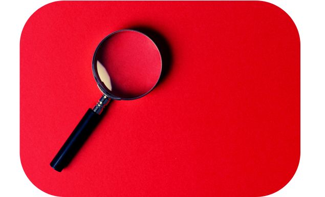 Jible magnifying glass in red background